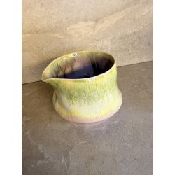 M�lkekande drejet i h�nden 